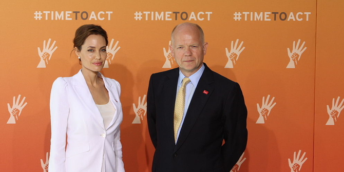 Angelina_Jolie_and_Foreign_Secretary_William_Hague_at_the_Global_Summit_to_End_Sexual_Violence_in_Conflict_2014