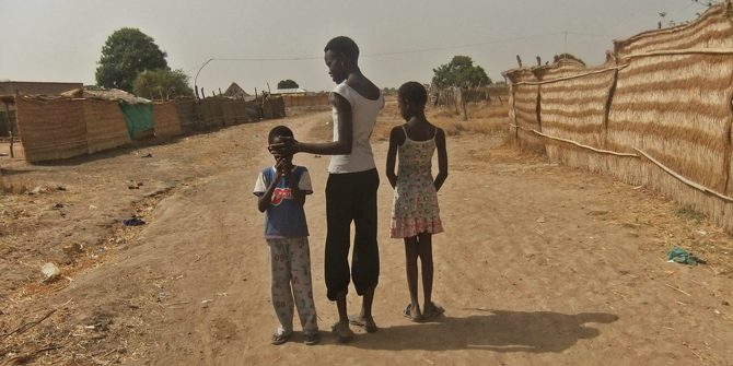 Three children, a year after repatriating from Israel (Mollie Gerver, Aweil, South Sudan, April 2012).