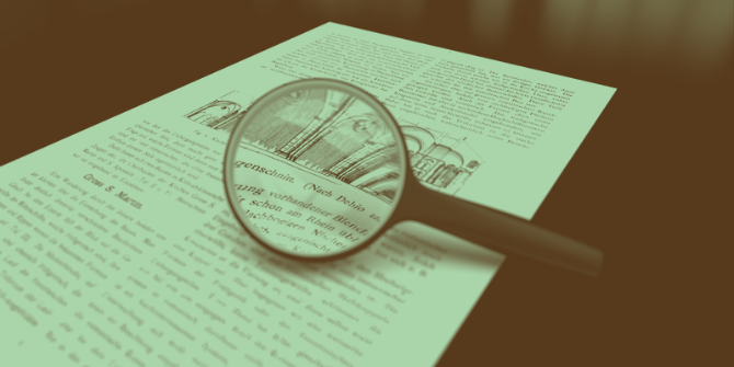 800px-Magnifying_glass_with_focus_on_paper