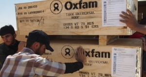 Oxfam team delivering T95 tanks to the warehouse in Zaatar from the Bicester warehouse