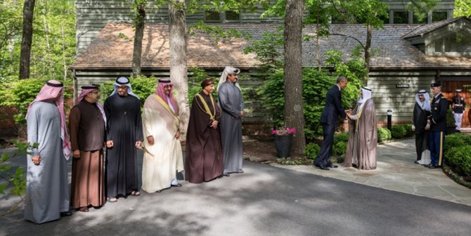 President Barack Obama shakes hands with His Highness Sheikh Sabah Al-Ahmad Al-Jaber Al Sabah, Amir of the State of Kuwait, as Gulf Cooperation Council (GCC) leaders prepare to have a group photo with the President outside of the Laurel Cabin at the conclusion of a summit meeting at Camp David, Md., May 14, 2015. (Official White House Photo by Pete Souza)